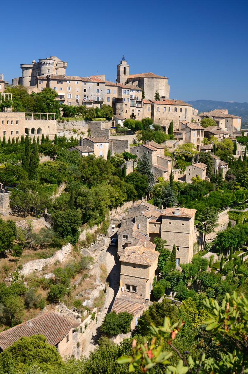 View of the hilltop village of Gordes from the Domaine du Val de Sault apartment hotel in the Luberon
